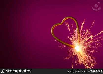 Burning sparkler in shape of heart. Wedding love Valentine&rsquo;s day banner.