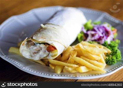 Burrito with grilled chicken and vegetables&#xA;