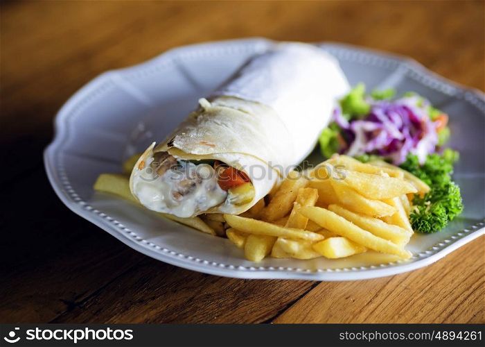 Burrito with grilled chicken and vegetables&#xA;