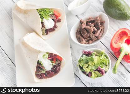Burritos with meat and guacamole