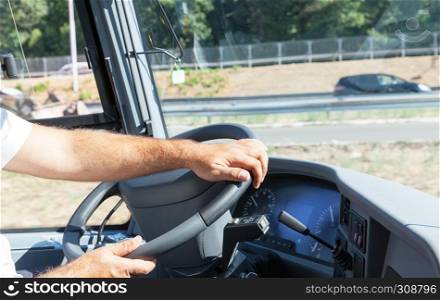 Bus or coach driver at work
