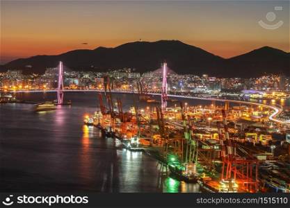 Busan harbor bridge lits up at night in busan, South Korea.