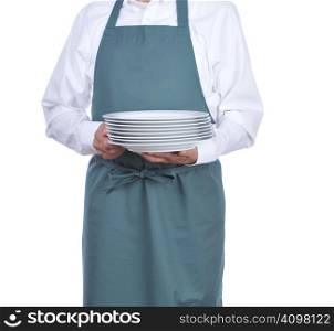 Busboy carrying a stack of plates - torso only