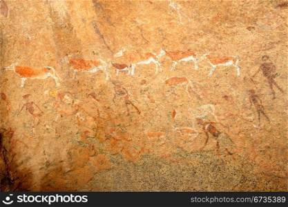 Bushmen rock painting of human figures and antelopes, Brandberg archaeological site, Namibia, southern Africa