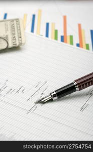 Business a theme. Diagrams from the share market, pens. Concept - exchange activity