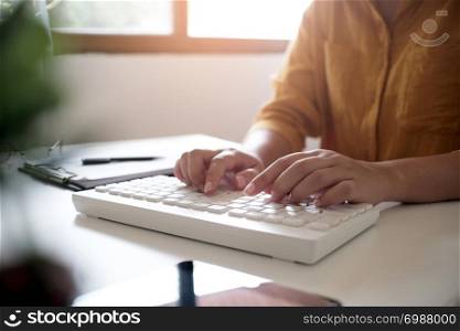 Business accounting women work with calculator and Laptop. Financial technology concept.