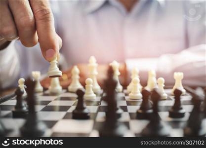 business administrator with chess board game, strategy and competition.