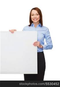 business, advertisement and education concept - friendly young smiling businesswoman with white blank board
