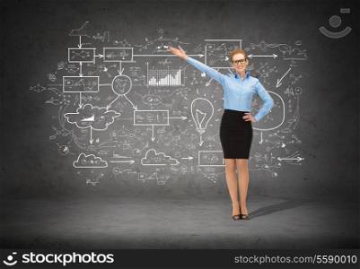 business, advertising and office concept - smiling businesswoman in eyeglasses pointing her hand at big plan