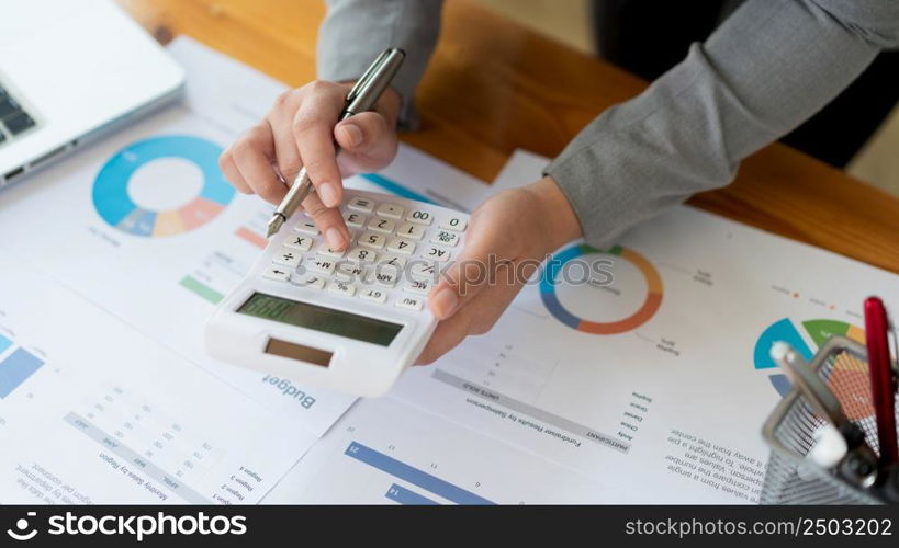 Business analyst concept the accountant calculating to estimate the amount of company&rsquo;s expense.