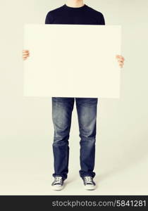 business and advertisement concept - man showing white blank board