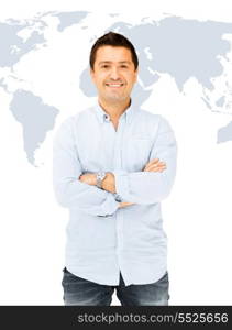 business and communication concept - handsome smiling man in casual shirt