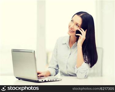 business and education concept - businesswoman with laptop and cell phone. businesswoman with laptop and cell phone