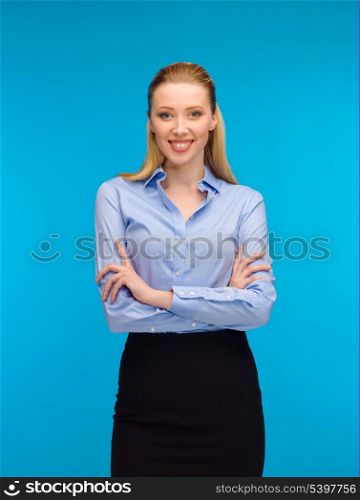 business and education concept - friendly young smiling businesswoman