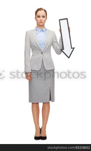 business and education concept - serious businesswoman with direction arrow sign