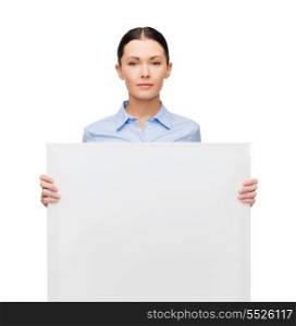 business and education concept - serious young smiling businesswoman with white blank board
