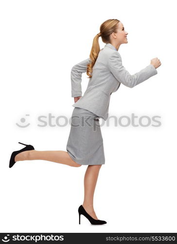 business and education concept - smiling businesswoman running