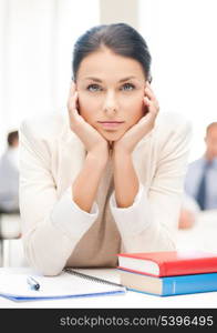 business and education concept - stressed businesswoman in office