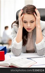 business and education concept - stressed businesswoman in office