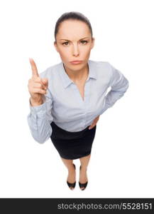 business and emotion concept - angry businesswoman with finger up