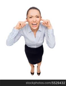 business and emotion concept - frightened businesswoman screaming with closed ears