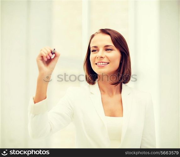 business and future technology concept - businesswoman writing in the air in the air