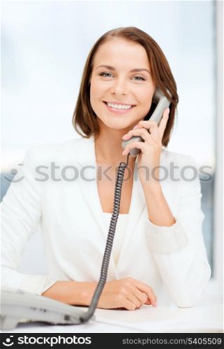 business and helpline concept - businesswoman with rotary phone calling