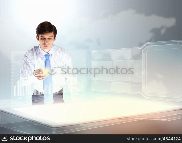 Business and innovation technologies. young businessman touching icon of high-tech image