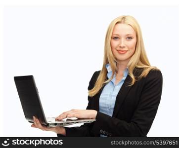 business and internet - smiling woman with laptop computer
