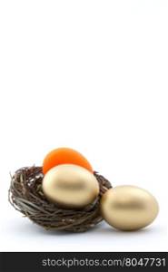Business and investment image with red and gold nest eggs reflects trouble, concern, and anxiety in financial and economic environment.