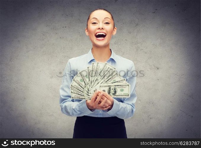 business and money concept - laughing businesswoman with dollar cash money