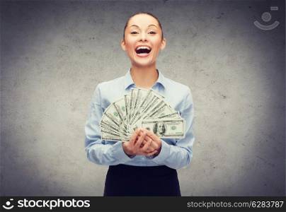 business and money concept - laughing businesswoman with dollar cash money