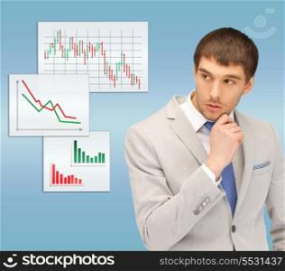 business and money concept - portrait picture of pensive man looking at forex charts