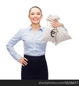 business and money concept - young businesswoman holding money bags with euro