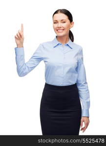 business and new technology concept - attractive young woman with her finger up