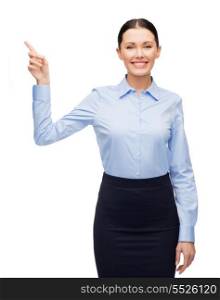 business and new technology concept - attractive young woman with her finger up