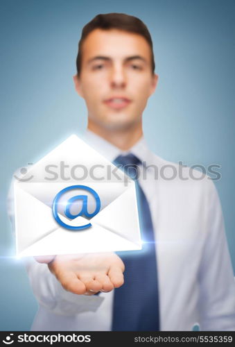 business and office, advertising, people concept - friendly young buisnessman showing something on the palm of his hand