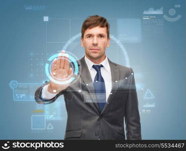 business and office, ban, veto, warning concept - attractive buisnessman working with virtual screen