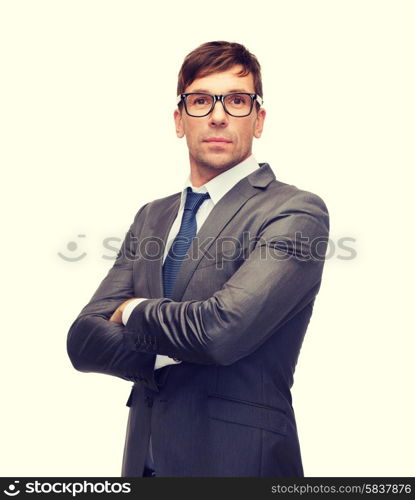 business and office concept - attractive buisnessman or teacher in glasses