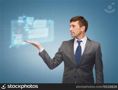 business and office concept - attractive buisnessman or teacher showing virtual screen on the palm
