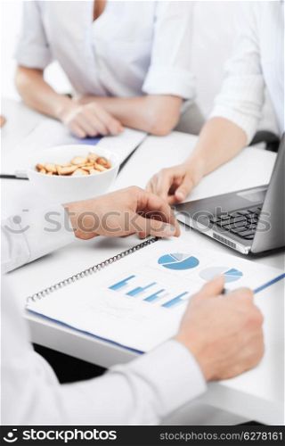 business and office concept - business team having discussion in office