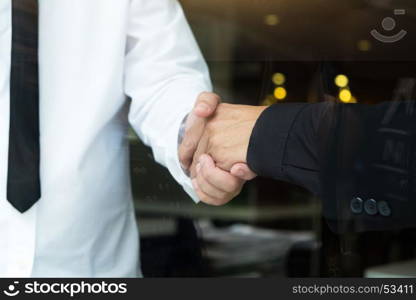 business and office concept - businessman shaking hands.