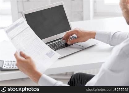 business and office concept - businessman working in office