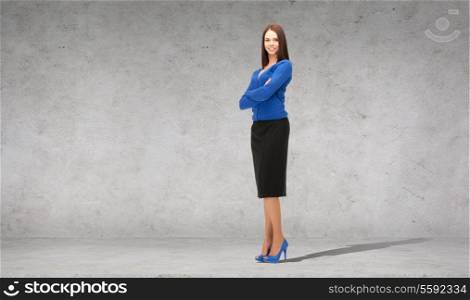 business and office concept - friendly young smiling businesswoman