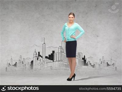 business and office concept - friendly young smiling businesswoman
