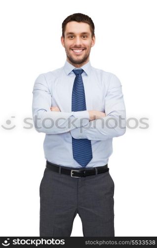 business and office concept - handsome buisnessman with crossed arms