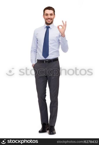 business and office concept - handsome businessman showing ok-sign