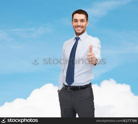 business and office concept - handsome businessman showing thumbs up