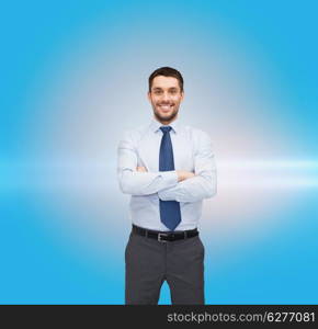 business and office concept - handsome businessman with crossed arms