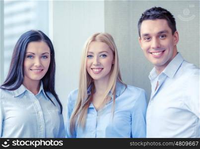 business and office concept - happy business team in office. happy business team in office